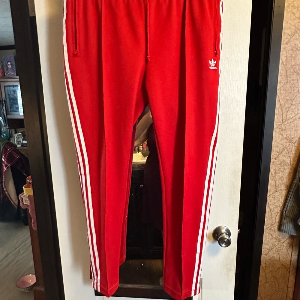 Adidas Red Sweatpants with Iconic Stripes